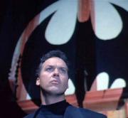 Batman - Micheal Keaton standing in Batsignal